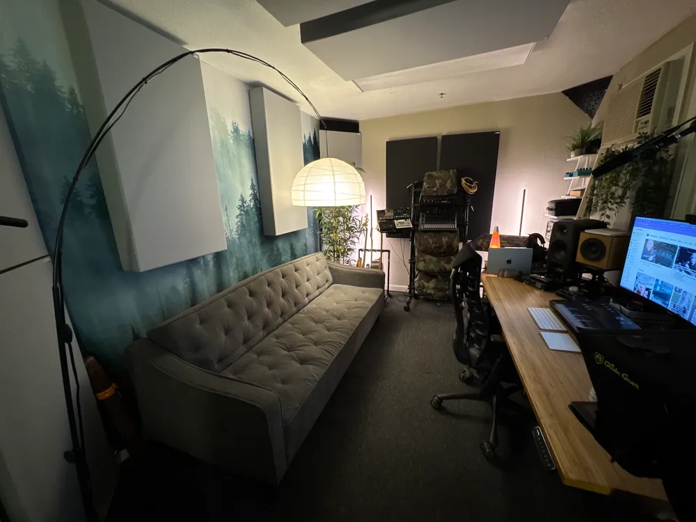 Inside the Dumarek studio: couch, mixing desk, monitors, and racked gear